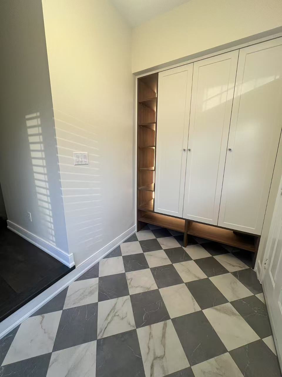 custom made closet with check board tile
